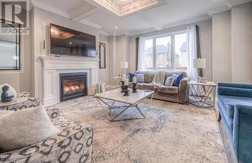 145 Harpin Way E, Centre Wellington, ON - Indoor Photo Showing Living Room With Fireplace