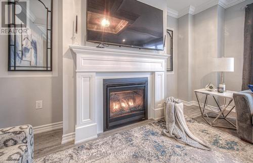 145 Harpin Way E, Centre Wellington, ON - Indoor With Fireplace