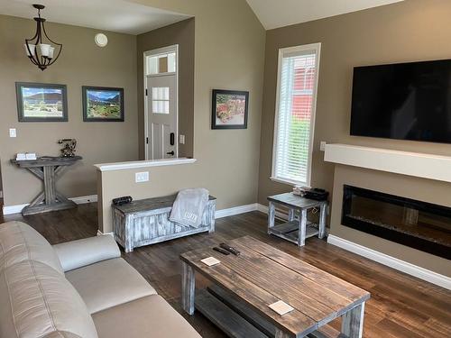 152-2450 Radio Tower Road, Oliver, BC - Indoor Photo Showing Living Room With Fireplace