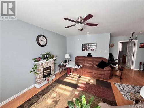 104 Water  South Street, Woodstock, NB - Indoor Photo Showing Living Room With Fireplace