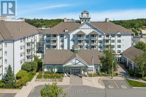 #410 -285 Steamship Bay Rd, Gravenhurst, ON - Outdoor With Balcony With Facade