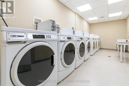 #410 -285 Steamship Bay Rd, Gravenhurst, ON - Indoor Photo Showing Laundry Room