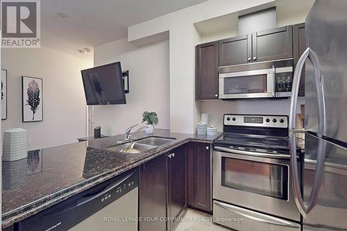#205 -15450 Yonge St, Aurora, ON - Indoor Photo Showing Kitchen With Double Sink