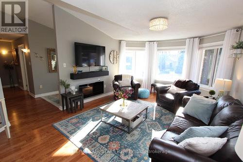 27 Hillview Dr, Kawartha Lakes, ON - Indoor Photo Showing Living Room With Fireplace