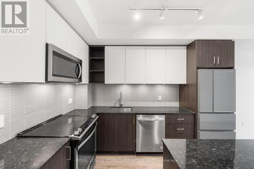 #908 -100 Eagle Rock Way, Vaughan, ON - Indoor Photo Showing Kitchen With Upgraded Kitchen