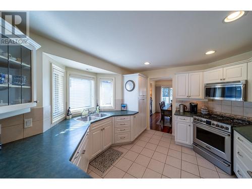3973 Gallaghers Circle, Kelowna, BC - Indoor Photo Showing Kitchen With Double Sink