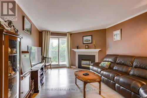 #307 -2228 Trafalgar St, London, ON - Indoor Photo Showing Living Room With Fireplace