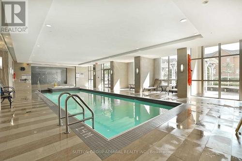 #630 -2480 Prince Michael Dr, Oakville, ON - Indoor Photo Showing Other Room With In Ground Pool