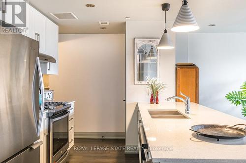 #609 -181 James St N, Hamilton, ON - Indoor Photo Showing Kitchen With Double Sink