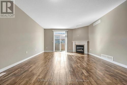 4 Mckinnell Lane, Hamilton, ON - Indoor Photo Showing Living Room With Fireplace