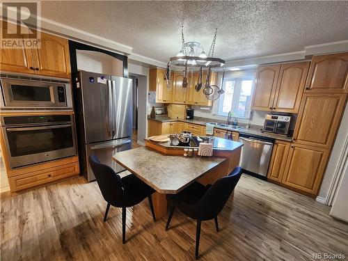 84 Evangeline Street, Grand Falls, NB - Indoor Photo Showing Kitchen With Double Sink