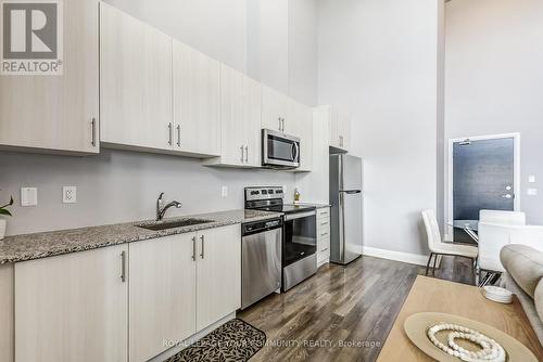 101 - 65 Yorkland Boulevard, Brampton, ON - Indoor Photo Showing Kitchen With Upgraded Kitchen