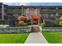 305-130 Sunningdale Rd East, Qualicum Beach, BC  - Outdoor With Balcony With Facade 