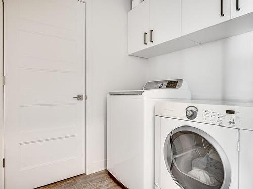 Laundry room - 653 Rue Du Chardonnay, Sainte-Marthe-Sur-Le-Lac, QC - Indoor Photo Showing Laundry Room