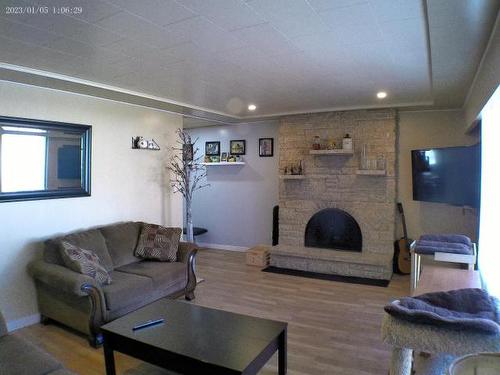 2214 Granite Ave, Merritt, BC - Indoor Photo Showing Living Room With Fireplace