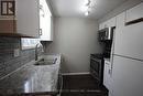 #74 -40 Tiffany Dr, London, ON  - Indoor Photo Showing Kitchen With Double Sink 
