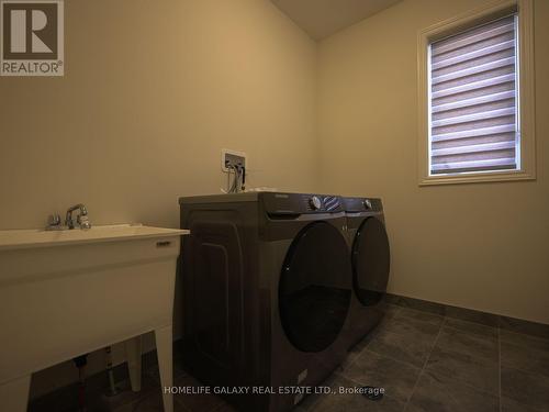 51 Sanford Circ, Springwater, ON - Indoor Photo Showing Laundry Room
