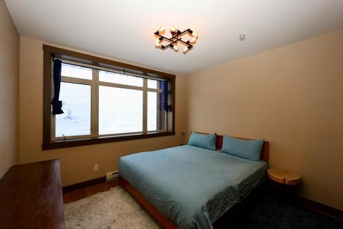 202A - 1420 Palliser Trail, Golden, BC - Indoor Photo Showing Bedroom