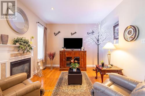 7 Millhouse Mews, Brampton, ON - Indoor Photo Showing Living Room With Fireplace