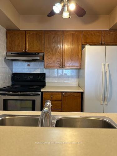 1710-1 Hickory Tree Rd, Toronto, ON - Indoor Photo Showing Kitchen With Double Sink