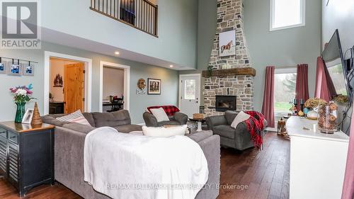 2388 Mcdonald Road, Springwater, ON - Indoor Photo Showing Living Room With Fireplace