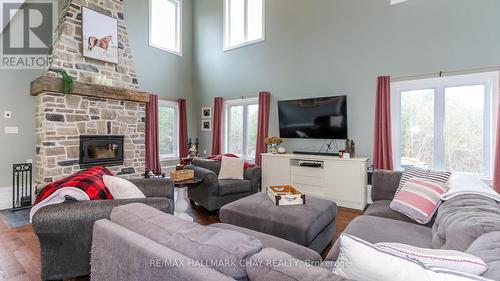 2388 Mcdonald Rd, Springwater, ON - Indoor Photo Showing Living Room With Fireplace