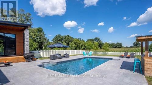 8037 Walkers Drive, Strathroy-Caradoc, ON - Outdoor With In Ground Pool With Backyard