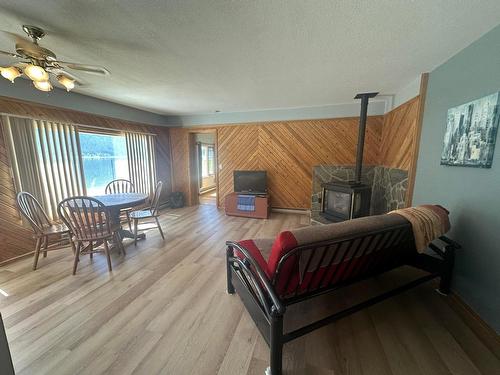 3220 Highway 3A, Nelson, BC - Indoor Photo Showing Living Room With Fireplace