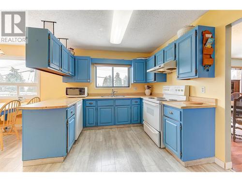 3384 Mcginnis Road, West Kelowna, BC - Indoor Photo Showing Kitchen With Double Sink