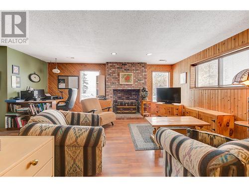 3384 Mcginnis Road, West Kelowna, BC - Indoor Photo Showing Living Room With Fireplace