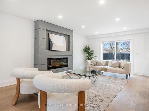 34 Kirkdene Dr, Toronto, ON - Indoor Photo Showing Living Room With Fireplace