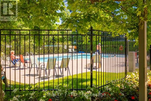 #909 -120 Promenade Circ, Vaughan, ON - Outdoor With In Ground Pool