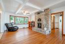 18038 Erie Shore Drive, Blenheim, ON  - Indoor Photo Showing Living Room With Fireplace 