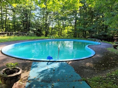 Pool - 8 Rue Highland, Sutton, QC - Outdoor With In Ground Pool With Backyard
