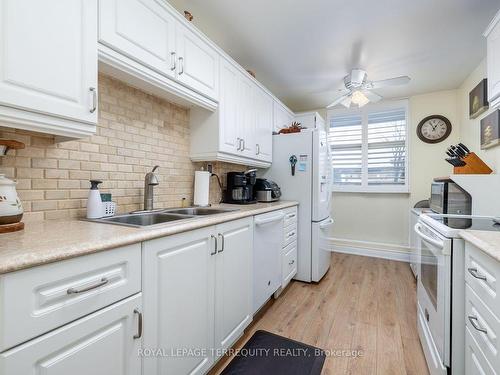 103-44 Falby Crt, Ajax, ON - Indoor Photo Showing Kitchen With Double Sink