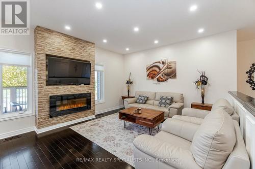 5761 Ironwood St, Niagara Falls, ON - Indoor Photo Showing Living Room With Fireplace