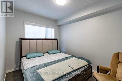 201 - 40 Carrington Plaza, Out Of Area, AB - Indoor Photo Showing Bedroom