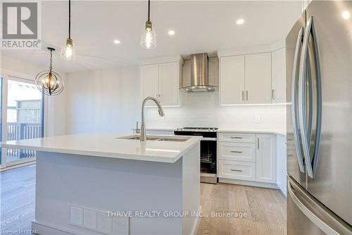 #16 -2261 Linkway Blvd, London, ON - Indoor Photo Showing Kitchen With Double Sink With Upgraded Kitchen