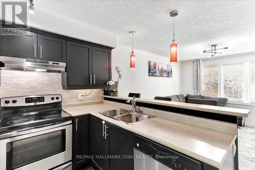 1 - 57 Ferndale Drive S, Barrie, ON - Indoor Photo Showing Kitchen With Double Sink With Upgraded Kitchen