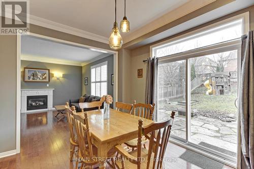 61 Button Cres, Uxbridge, ON - Indoor Photo Showing Dining Room With Fireplace