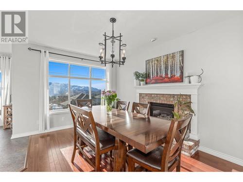 2844 Doucette Drive, West Kelowna, BC - Indoor Photo Showing Dining Room With Fireplace