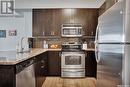 121 158 Pawlychenko Lane, Saskatoon, SK  - Indoor Photo Showing Kitchen With Double Sink With Upgraded Kitchen 