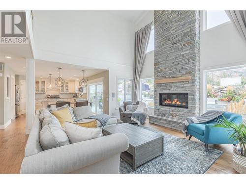 309 Tanager Drive, Kelowna, BC - Indoor Photo Showing Living Room With Fireplace