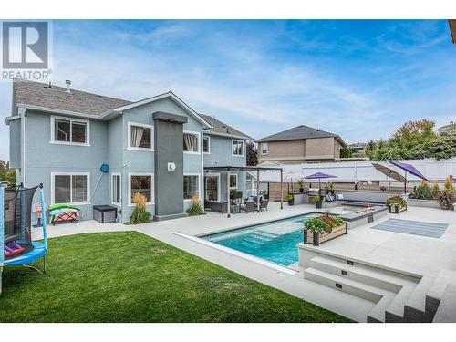 309 Tanager Drive, Kelowna, BC - Outdoor With In Ground Pool With Deck Patio Veranda