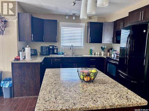 112 2311 Windsor Park Road, Regina, SK - Indoor Photo Showing Kitchen With Upgraded Kitchen