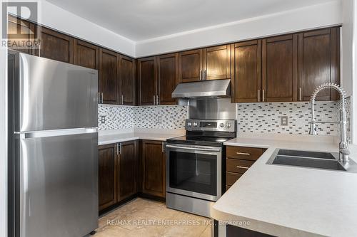 702 - 2545 Erin Centre Boulevard, Mississauga, ON - Indoor Photo Showing Kitchen With Double Sink
