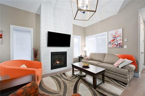 744 Nelson Street|Unit #24, Port Dover, ON - Indoor Photo Showing Living Room With Fireplace