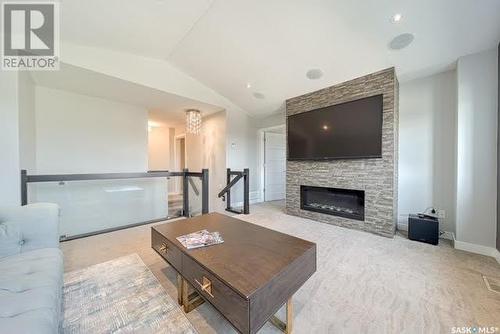 3961 Sandhill Crescent, Regina, SK - Indoor Photo Showing Living Room With Fireplace
