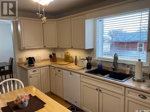 214 7Th Avenue W, Rosetown, SK - Indoor Photo Showing Kitchen With Double Sink