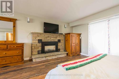 16 O'Neil Crescent, Quinte West, ON - Indoor Photo Showing Bedroom With Fireplace